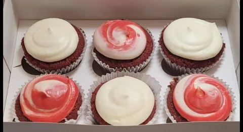 Red velvet cupcakes with cream cheese frosting